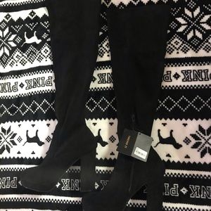 Over the knee black boots